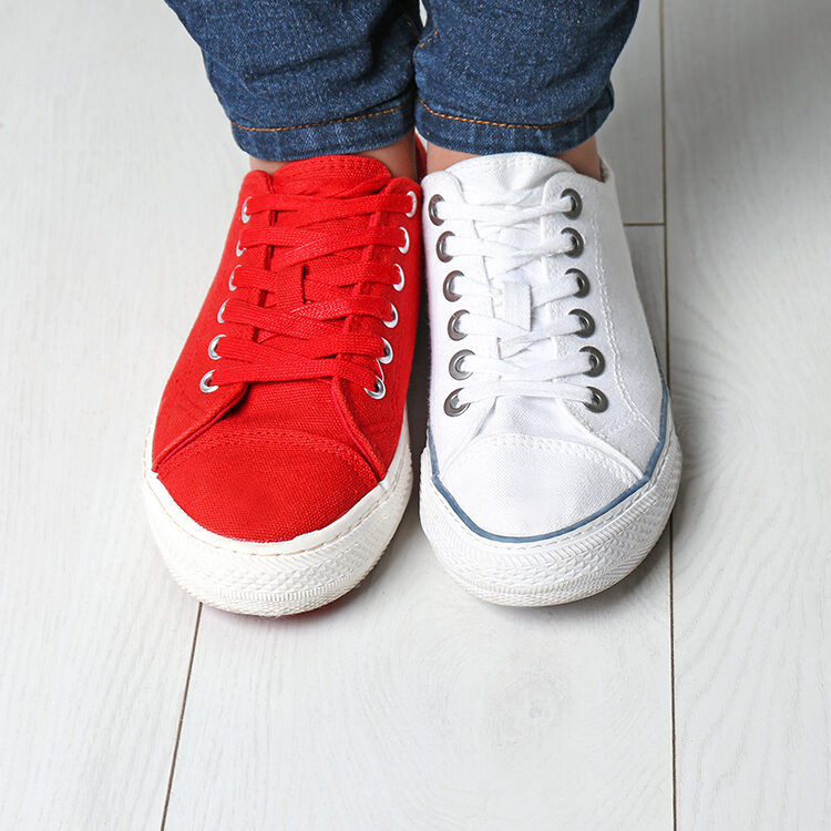 Canvas sneakers left shoe is red, right show is white